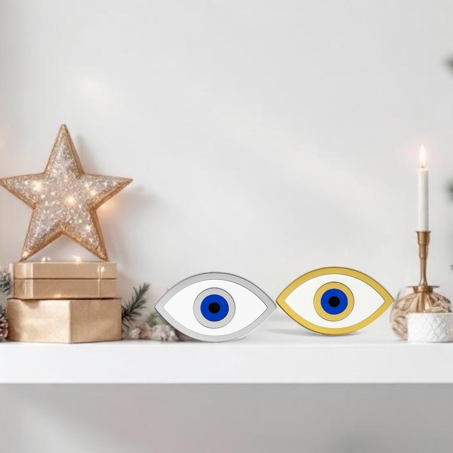Decorative shelf with star, eye-shaped mirrors, and candle on a white background