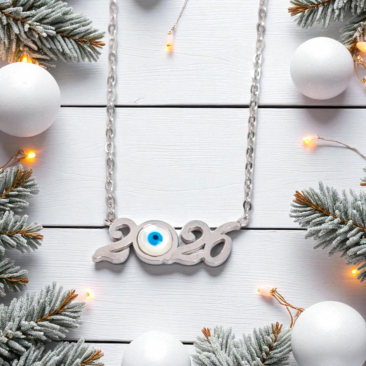 Κολιέ γούρι 2026 από ατσάλι με μάτι σε ασημί – Λιανική & χονδρική So Cute by Dimi