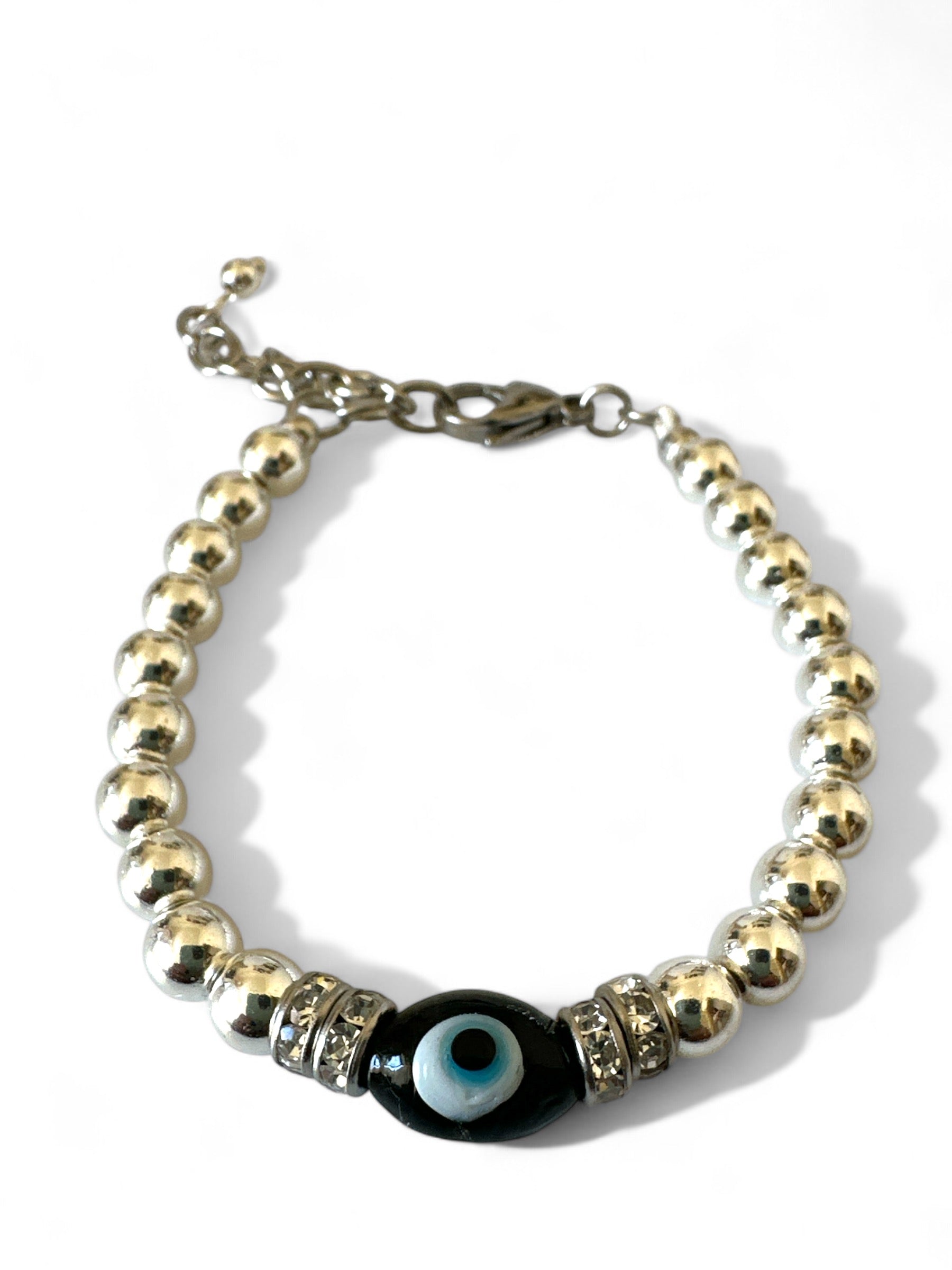 Χειροποίητο βραχιόλι με αιματίτη, στρας και lampwork μάτι – So Cute by Dimi