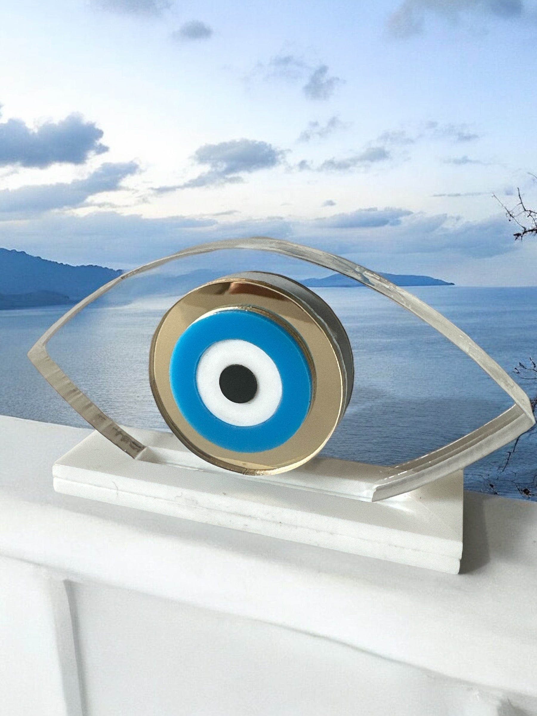 Γούρι διάφανο πλεξιγκλάς μικρό οβάλ μάτι σε βάση - So Cute by Dimi