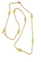 Μακριά χρυσαφί ατσάλινη αλυσίδα λαιμού 80εκ. με διακοσμητικά μοτίβα D και κούμπωμα T-bar.