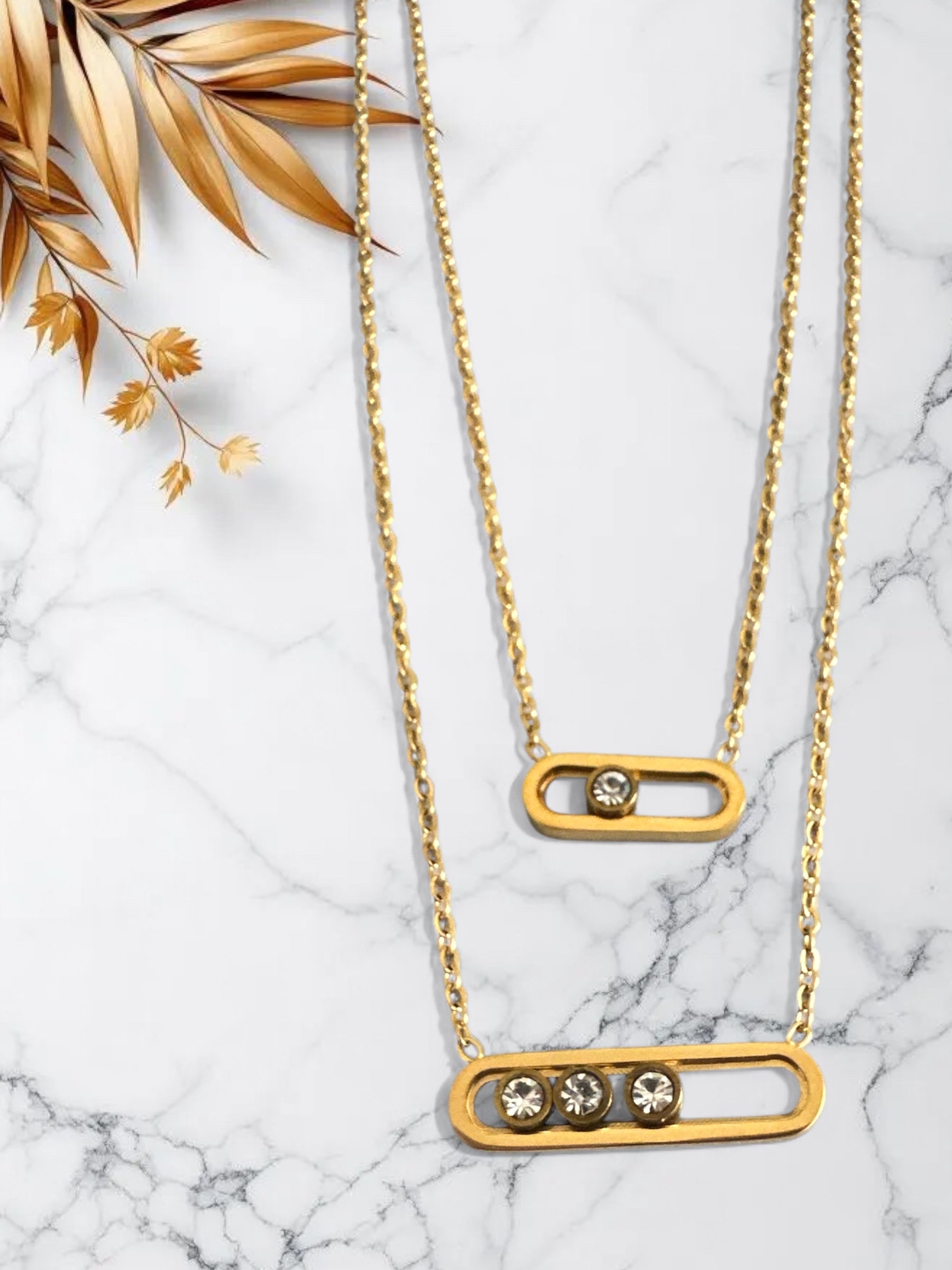 Διπλό ατσάλινο κολιέ με ζιργκόν, σε χρυσό και ασημί χρώμα, με κομψό industrial design