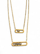 Διπλό ατσάλινο κολιέ με ζιργκόν, σε χρυσό και ασημί χρώμα, με κομψό industrial design