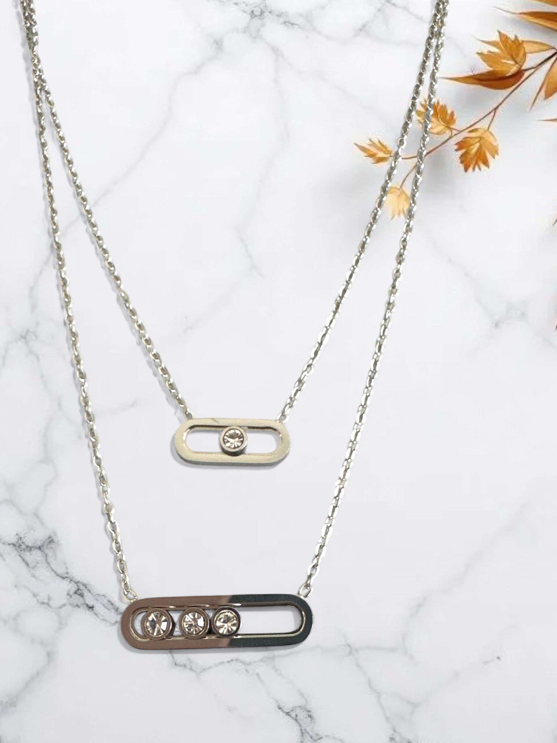 Διπλό ατσάλινο κολιέ με ζιργκόν, σε χρυσό και ασημί χρώμα, με κομψό industrial design