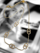 Ατσάλινο γυναικείο κολιέ με κρίκους και ζιργκόν, σε χρυσό και ασημί φινίρισμα, μήκους 40+5 εκ.