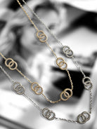 Ατσάλινο γυναικείο κολιέ με κρίκους και ζιργκόν, σε χρυσό και ασημί φινίρισμα, μήκους 40+5 εκ.