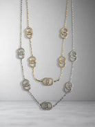 Ατσάλινο γυναικείο κολιέ με κρίκους και ζιργκόν, σε χρυσό και ασημί φινίρισμα, μήκους 40+5 εκ.