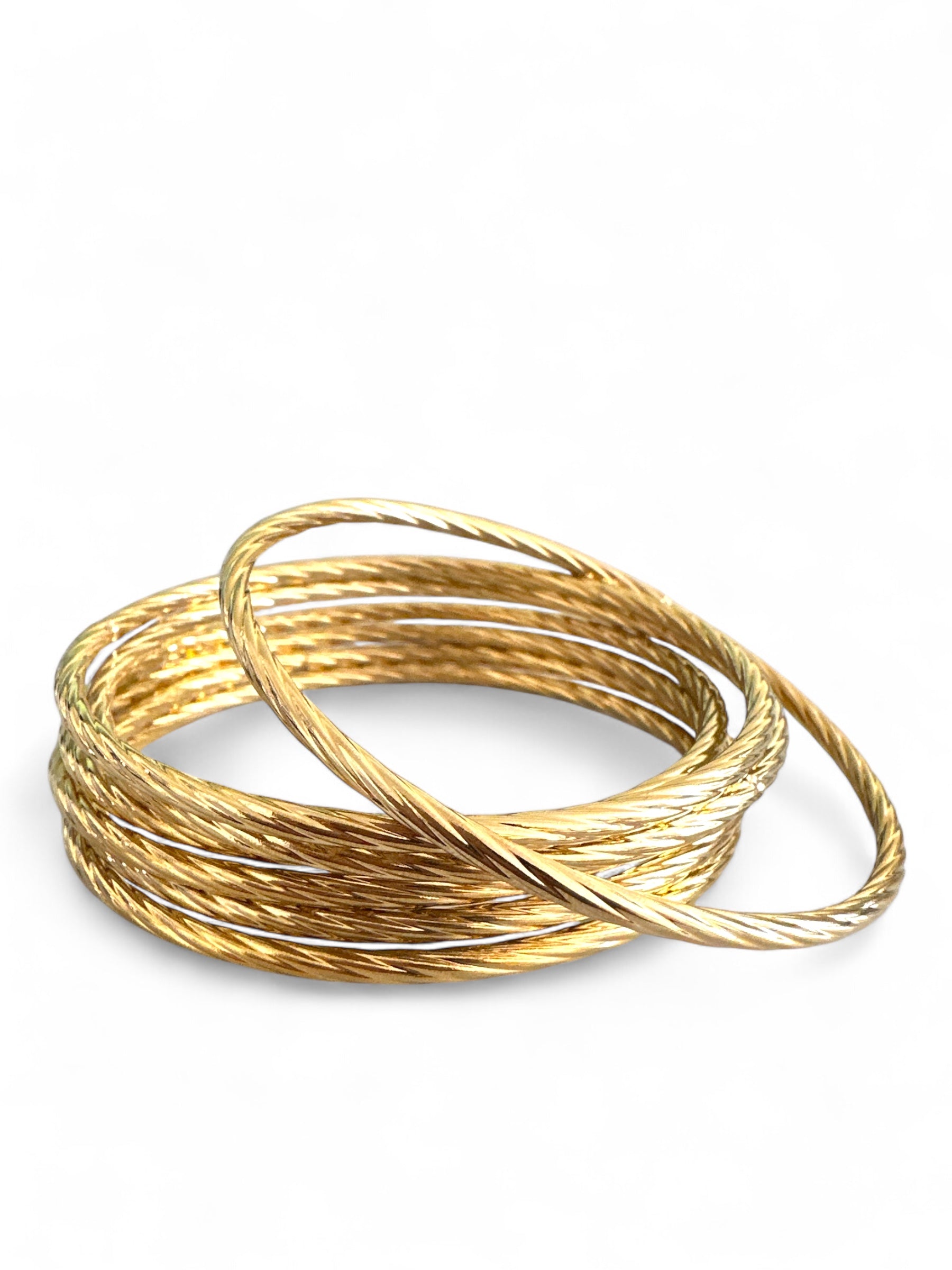 Aτσάλινα στριφτά βραχιόλια σε χρυσό χρώμα