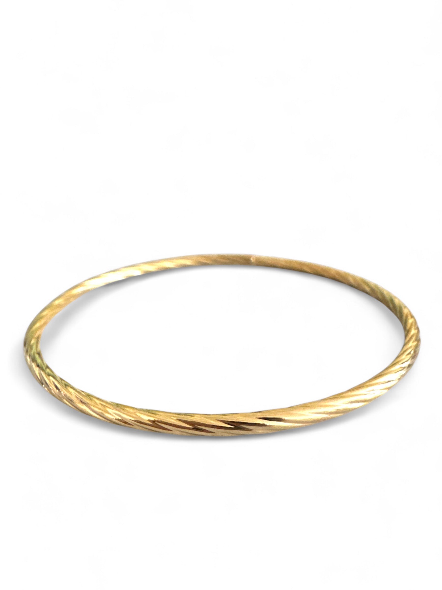 Aτσάλινο στριφτό βραχιόλι σε χρυσό  χρώμα