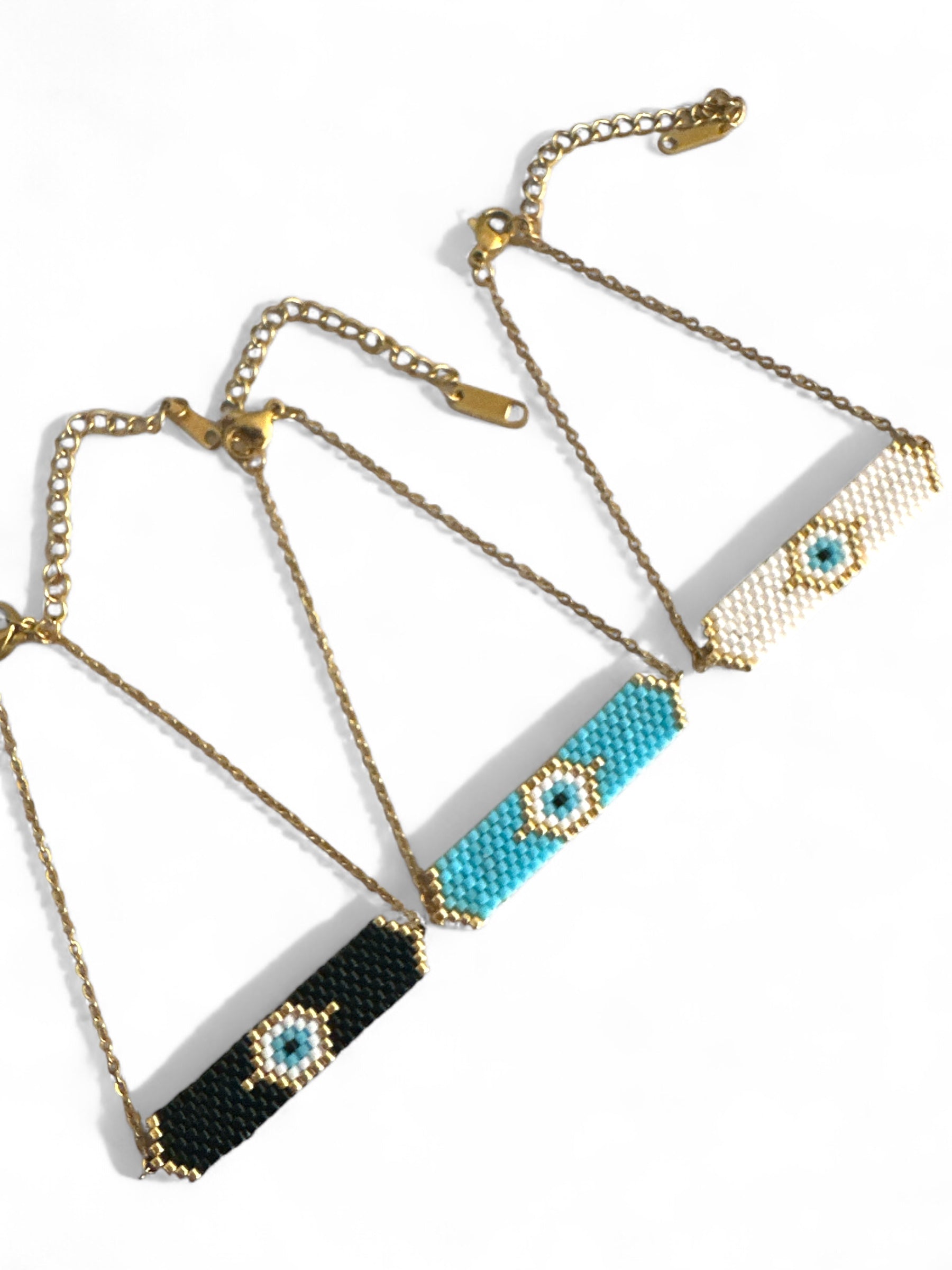 Ατσάλινα βραχιόλια με αλυσίδα και μοτίφ με μάτι από χάντρες Miyuki σε μαύρο, τιρκουάζ και λευκό