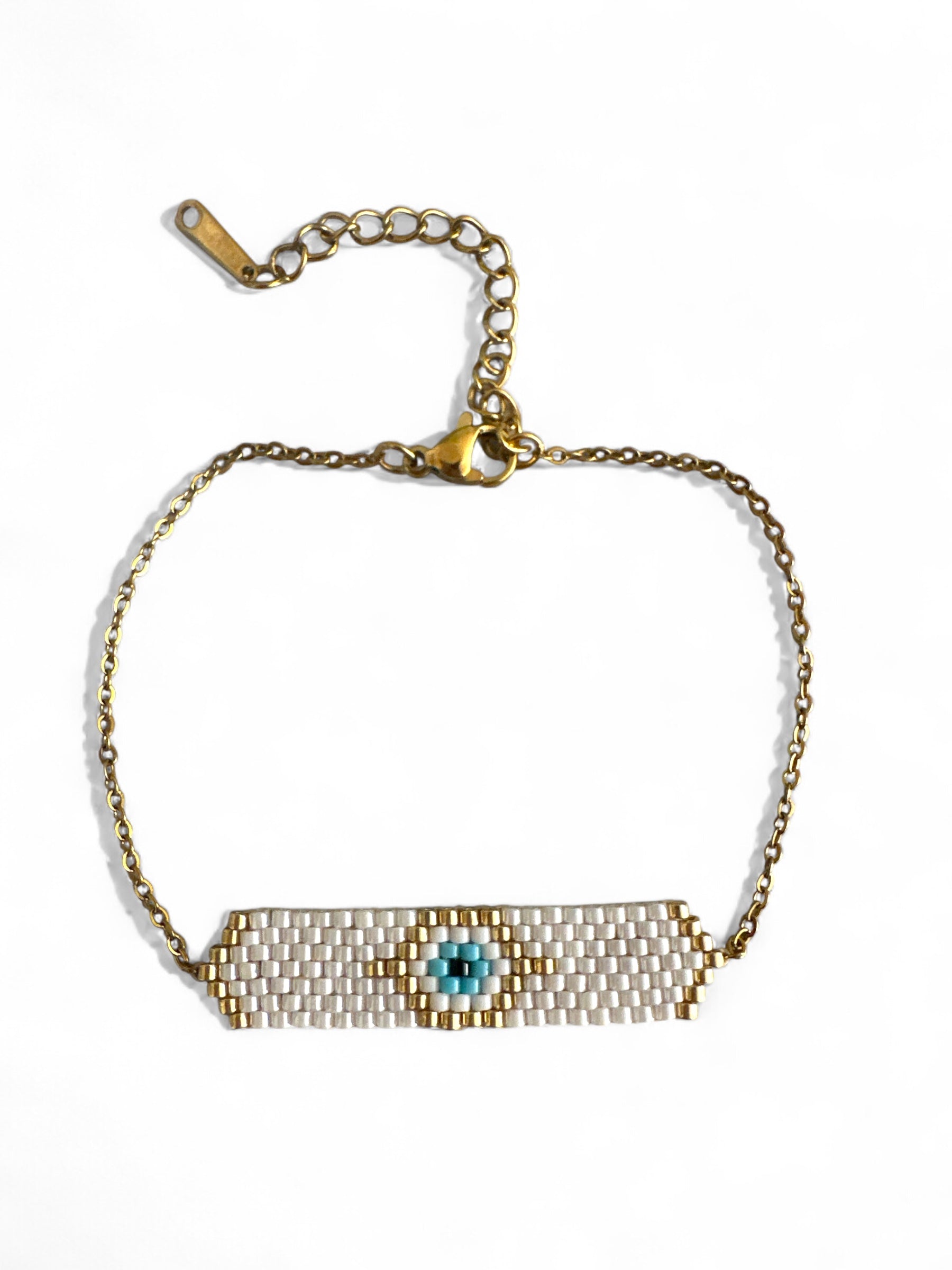 Ατσάλινo βραχιόλι με αλυσίδα και μοτίφ με μάτι από χάντρες Miyuki σε λευκό