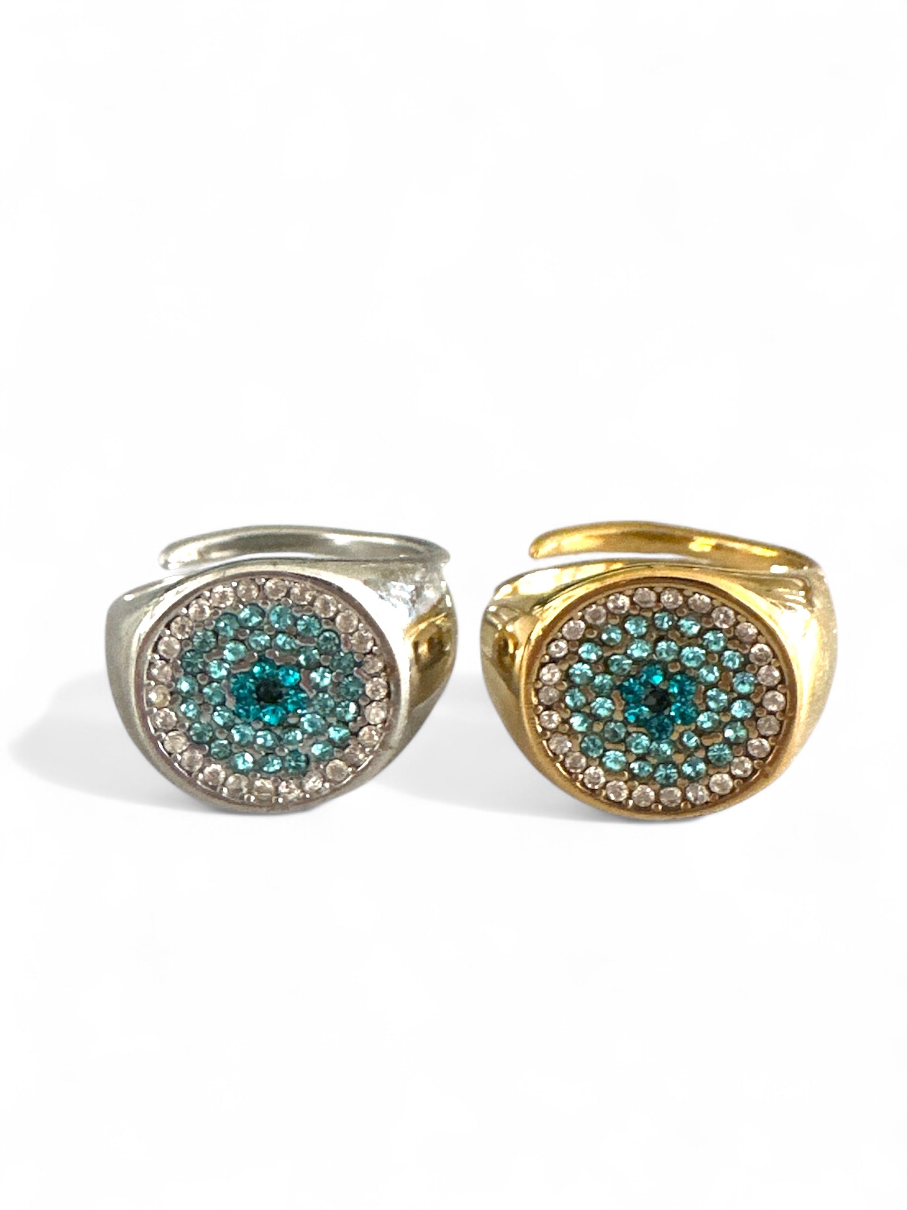 Ατσάλινα δαχτυλίδια So Cute By Dimi σε χρυσό και ασημί με κυκλικό σχέδιο και ζιργκόν σε τιρκουάζ και διάφανο χρώμα.