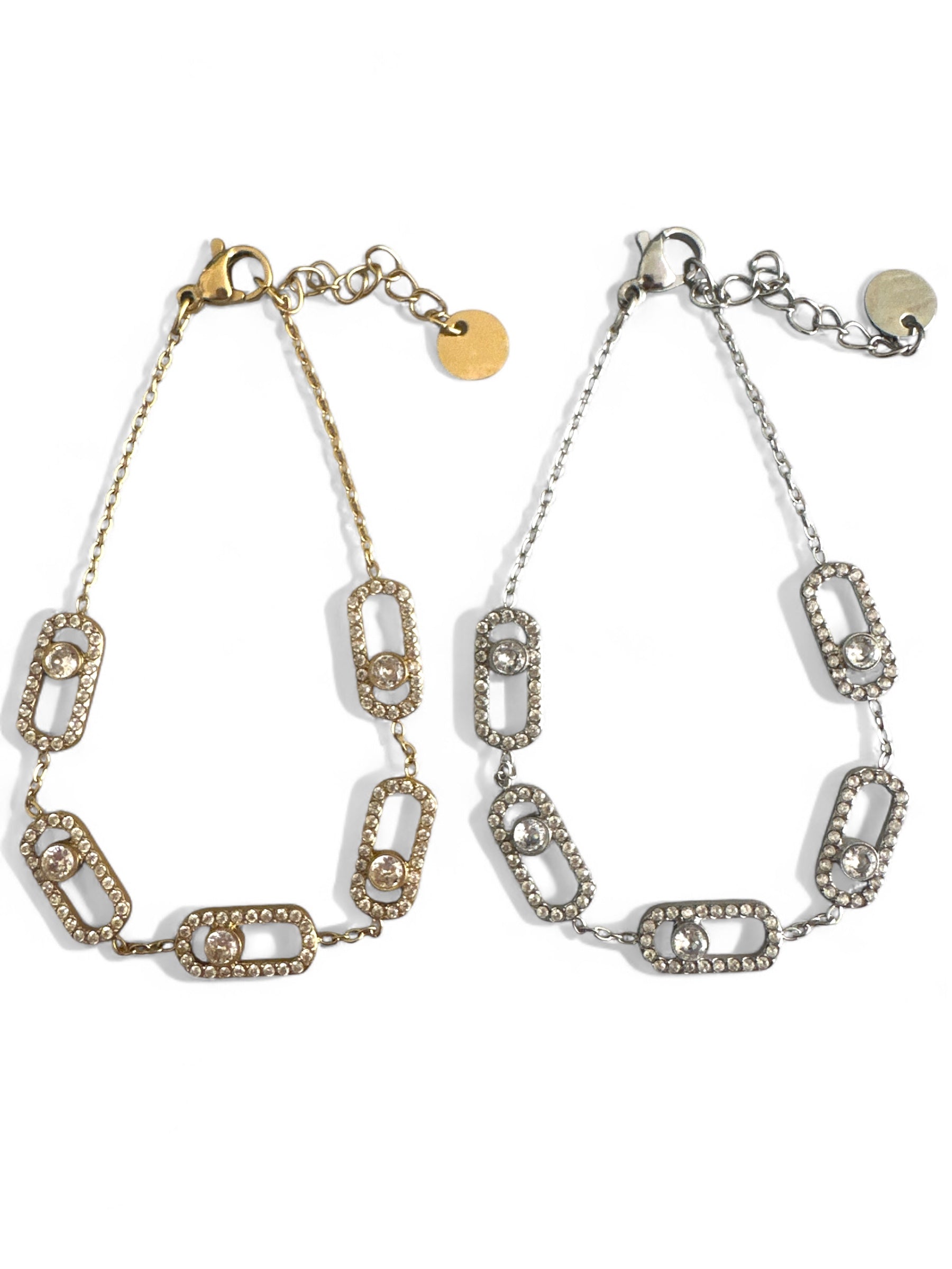 Ατσάλινα βραχιόλια So Cute By Dimi σε χρυσό και ασημί, με ορθογώνιους κρίκους διακοσμημένους με pavé ζιργκόν και κεντρικό μονό ζιργκόν.