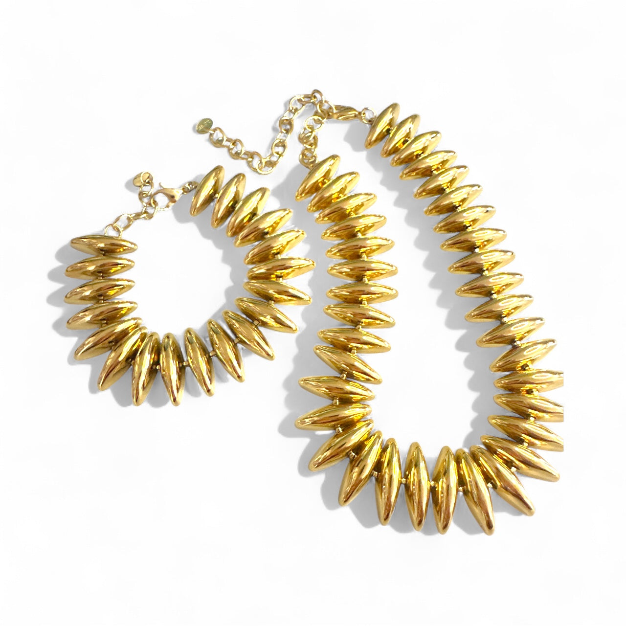 Ατσάλινο βραχιόλι και κολιέ Steel Shine με οβάλ χάντρες σε χρυσό So Cute by Dimi