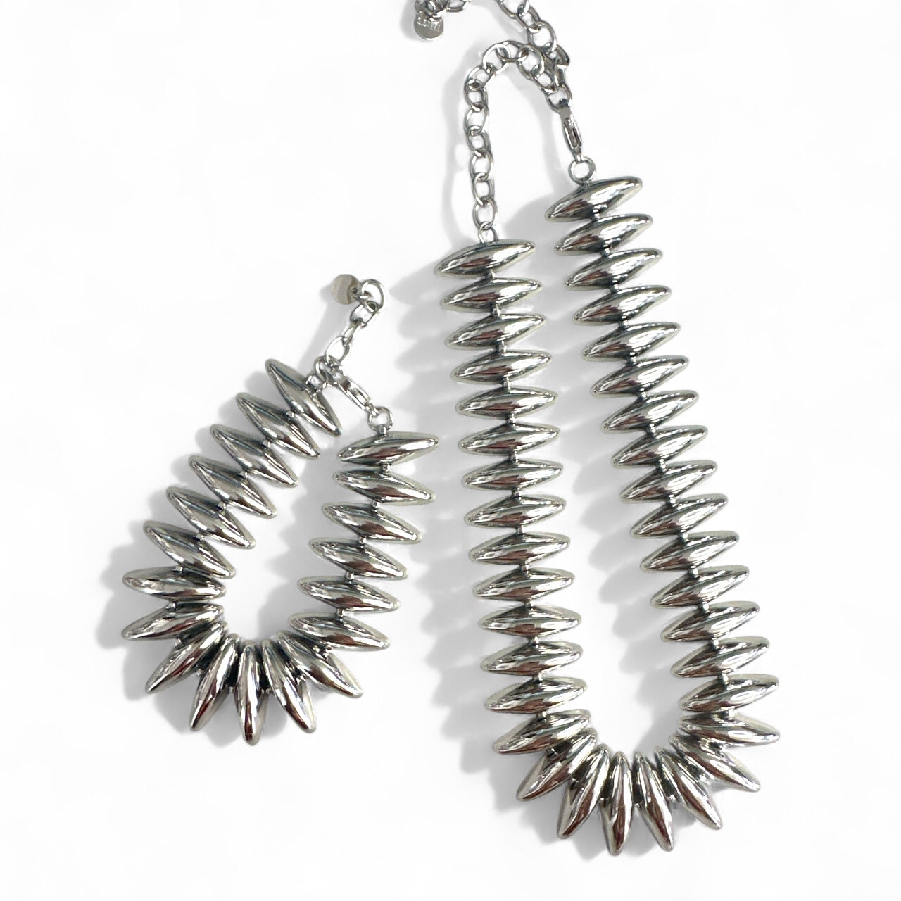 Ατσάλινο βραχιόλι και κολιέ Steel Shine με οβάλ χάντρες σε ασημί So Cute by Dimi