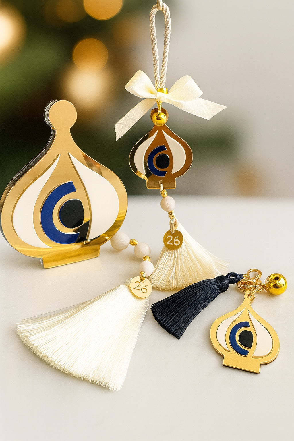 Γούρια σκόρδο με μάτι και φούντες 2026 σε χρυσό και λευκό – So Cute by Dimi