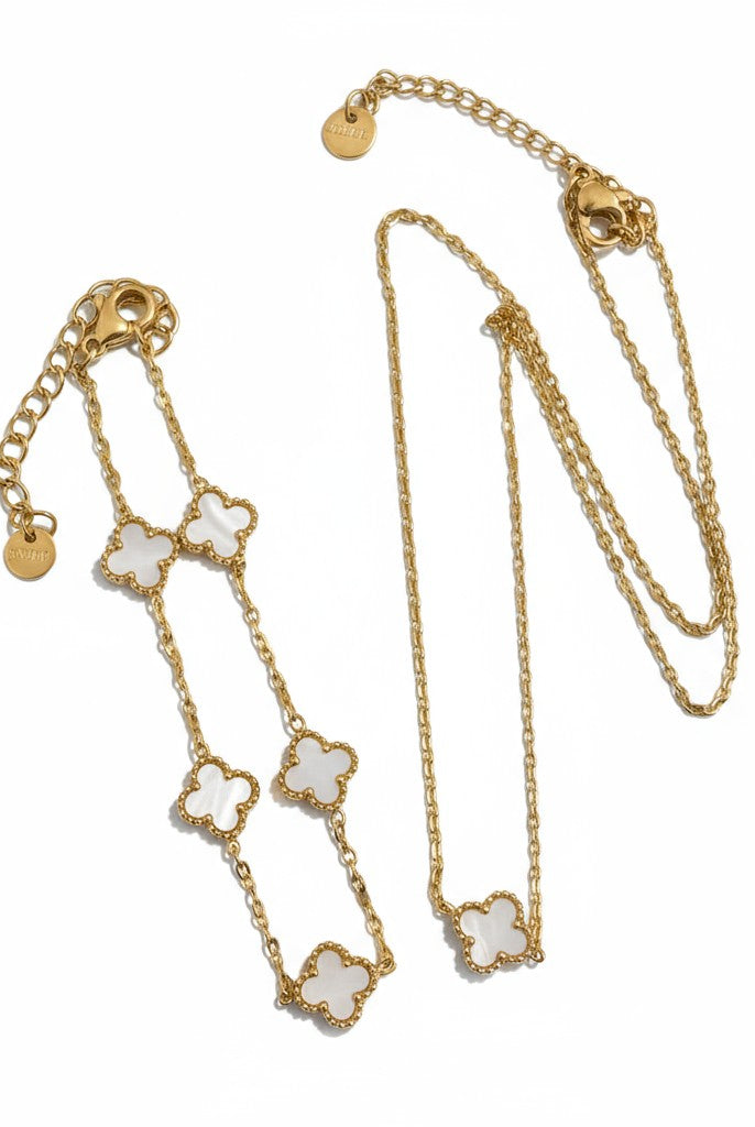 Ατσάλινο κολιέ & βραχιόλι So Cute by Dimi με χρυσή αλυσίδα και τετράφυλλο μοτίφ σε μαύρο ή λευκό φίλντισι