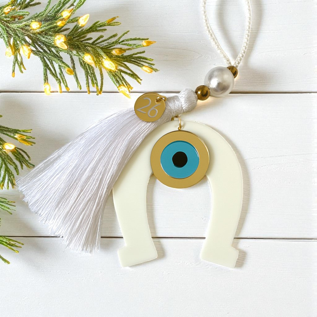 Γούρι πέταλο από πλεξιγκλάς με μάτι και φούντα – So Cute by Dimi