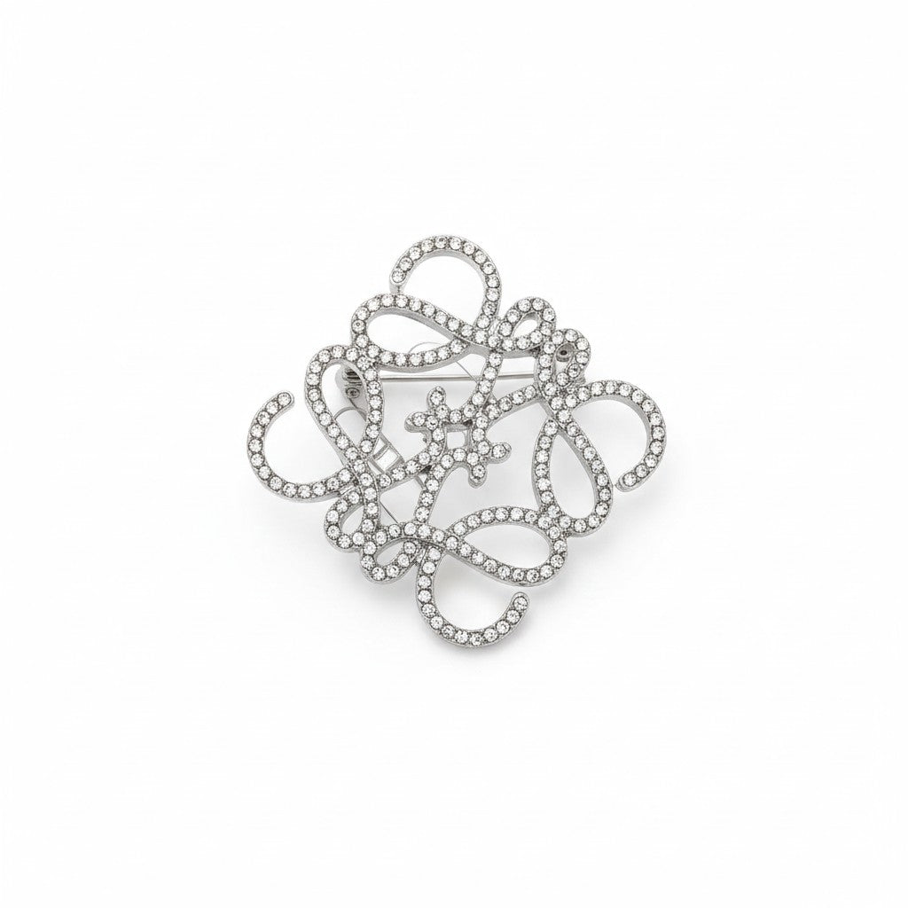 Metal filigree brooch with rhinestones in silver and gold – So Cute by Dimi.