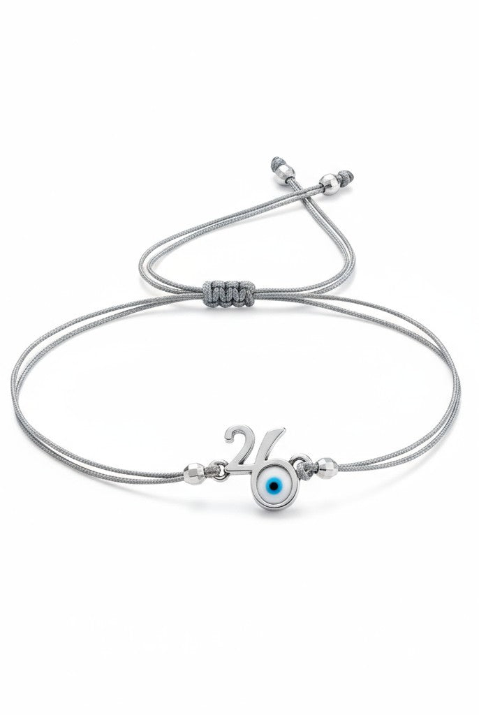 Ανδρικό βραχιόλι-γούρι 2026 με μάτι και κορδόνι σε τέσσερα χρώματα. So Cute by Dimi