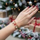 Χρυσό βραχιόλι γούρι 2026 με charms candy cane, δέντρο και χάντρες – So Cute by Dimi
