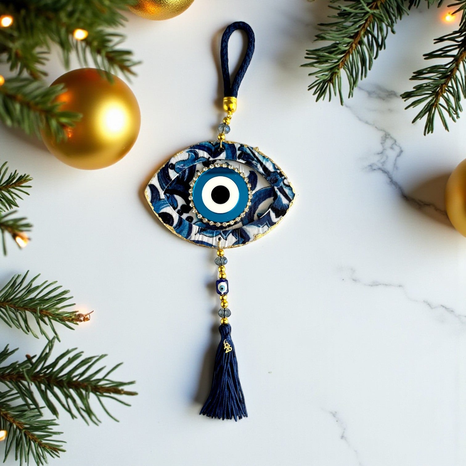 Γούρι 2026 κρεμαστό μάτι με στρας, χάντρες & φούντα – Greek Wishes Λιανική So Cute by Dimi