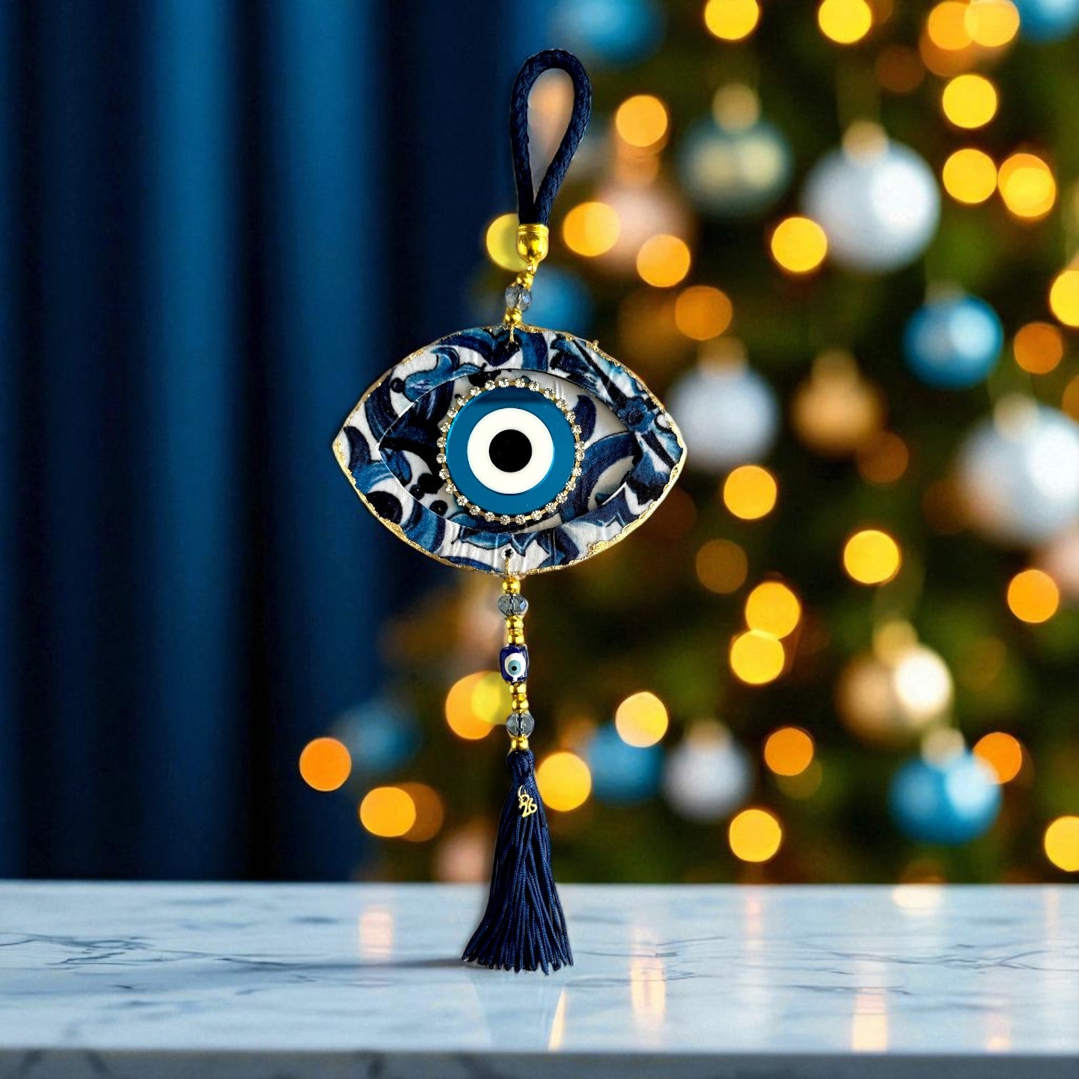 Γούρι 2026 κρεμαστό μάτι με στρας, χάντρες & φούντα – Greek Wishes Λιανική So Cute by Dimi