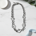 Rhombus Glow Necklace – Ατσάλινο κολιέ με ρομβοειδείς συνδέσμους και ζιργκόν σε ασημί  So Cute by Dimi