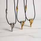 Κολιέ Melted Heart από ατσάλι σε χρυσό, ασημί και δίχρωμο με μαύρο κορδόνι, μήκους 80 εκ.