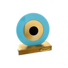 Επιτραπέζιο γούρι μάτι από πλεξιγκλάς σε γαλάζιο με χρυσό καθρέφτη και ξύλινη βάση – So Cute by Dimi