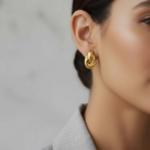 Twist Harmony – Ατσάλινα Σκουλαρίκια Κρίκοι με Κόμπους - So Cute by Dimi