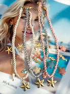 Golden Shore – Χειροποίητο boho κολιέ με πλεκτό κορδόνι και θαλασσινά charms από τη συλλογή Charm Party – So Cute by Dimi