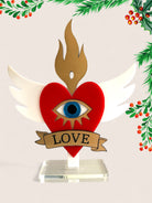 Επιτραπέζιο γούρι Christmas Pop Love Heart από plexiglass με μάτι, φλόγα, φτερά & banner LOVE – So Cute by Dimi