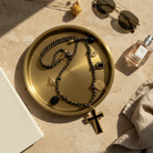 Ατσάλινο κολιέ Black Cross με μαύρο σταυρό & charms σε μαύρο κορδόνι – So Cute by Dimi