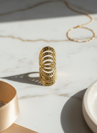 Χρυσό ατσάλινο statement δαχτυλίδι με ανάγλυφο open design – So Cute by Dimi