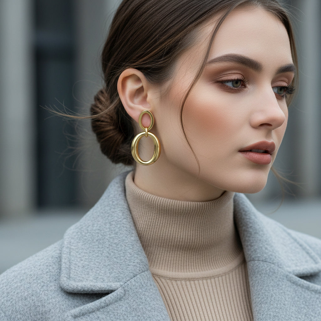 Ατσάλινα διπλά οβάλ statement σκουλαρίκια σε χρυσό και ασημί – Double Oval Glow από την So Cute by DImi