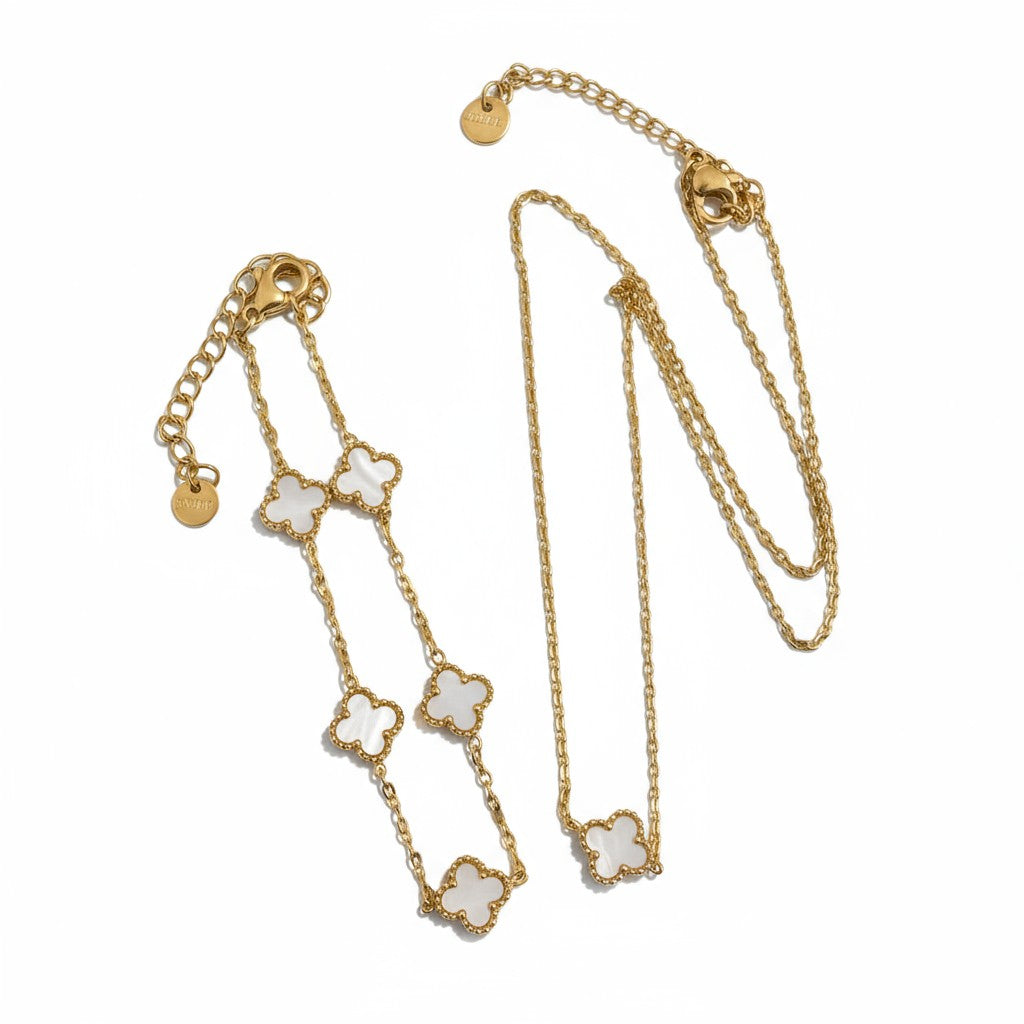 Ατσάλινο κολιέ & βραχιόλι So Cute by Dimi με χρυσή αλυσίδα και τετράφυλλο μοτίφ σε μαύρο ή λευκό φίλντισι
