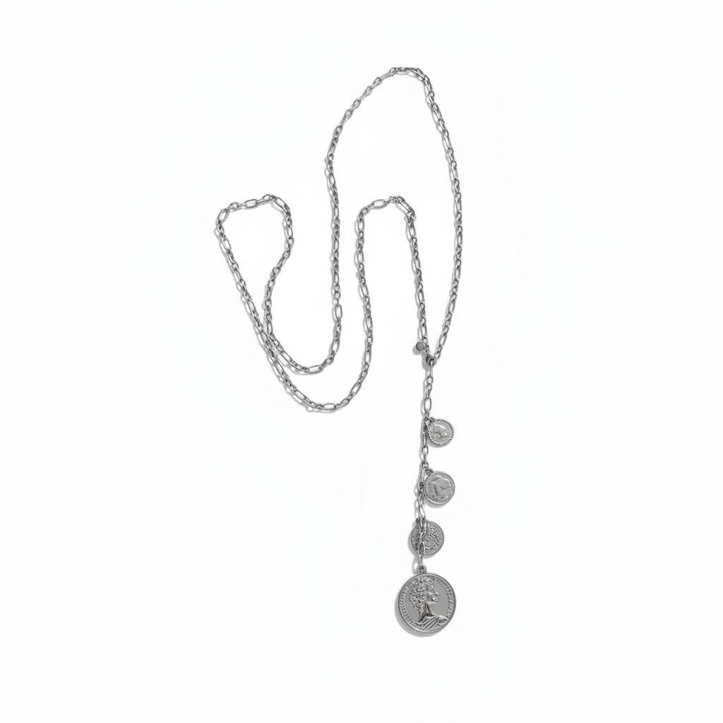 Aelia Coins Y-Chain – Μακρύ ατσάλινο κολιέ 106εκ με κρεμαστές λίρες σε Y-shape, σε silver ή gold.