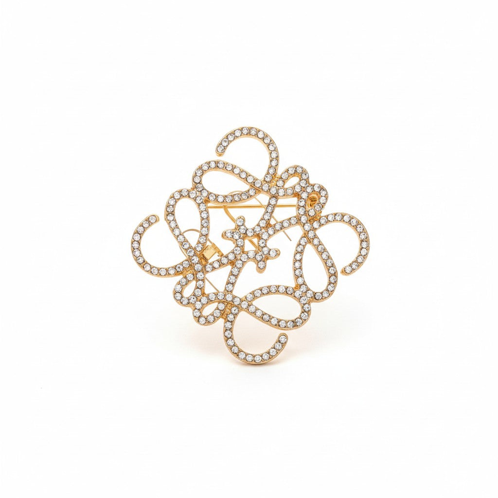 Metal filigree brooch with rhinestones in silver and gold – So Cute by Dimi.