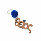 Ξύλινο χειροποίητο μπρελόκ «Θείος» με μπλε πον πον και γκλίτερ καρδούλα – So Cute by Dimi