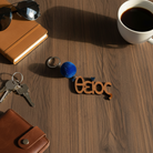 Ξύλινο χειροποίητο μπρελόκ «Θείος» με μπλε πον πον και γκλίτερ καρδούλα – So Cute by Dimi