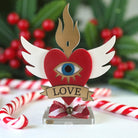 Επιτραπέζιο γούρι Christmas Pop Love Heart από plexiglass με μάτι, φλόγα, φτερά & banner LOVE – So Cute by Dimi