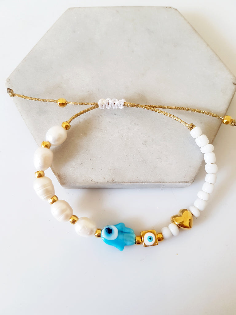 Βραχιόλι με φυσικές πέρλες και lampwork χεράκι με μάτι - So Cute by Dimi
